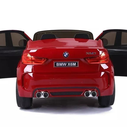 Naujas BMW X6M raudonos spalvos – elektrinis važiavimo automobilis