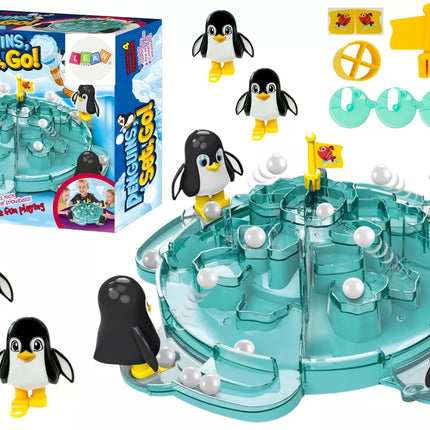 Pingvinas spardo kamuolį į ledkalnį