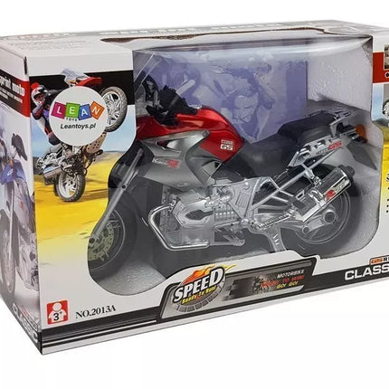 Raudonas motociklas su baterijomis, šviesomis ir muzika