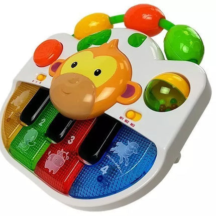 Pianinas su beždžionėle kūdikiui. Garsas ir šviesa