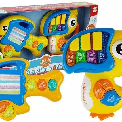 Baterijomis valdomas papūgos formos pianinas ir gitara