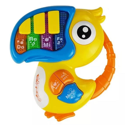 Baterijomis valdomas papūgos formos pianinas ir gitara