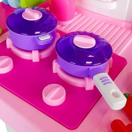 Rožinė virtuvėlė su vandens indais, maisto produktais ir garsais