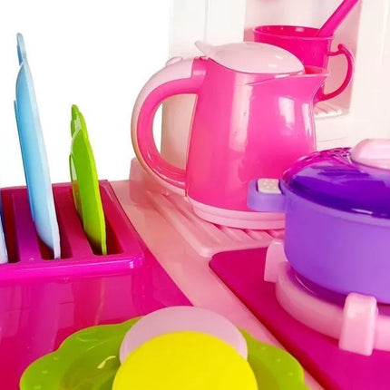 Rožinė virtuvėlė su vandens indais, maisto produktais ir garsais