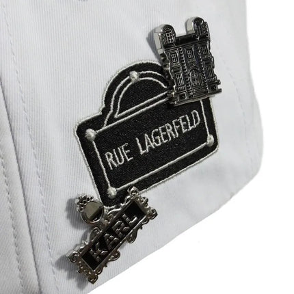 Karl Lagerfeld Paris balta kepurė su dirželiu – L5WH7947-wht
