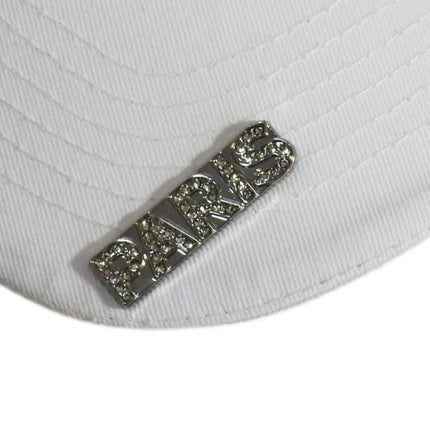Karl Lagerfeld Paris balta kepurė su dirželiu – L5WH7947-wht