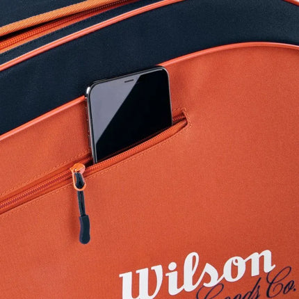 Teniso krepšys Wilson Roland Garros 2026 Team 6PK, oranžinės ir tamsiai mėlynos spalvos WR8053301001