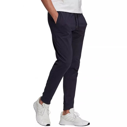 Adidas Essentials Single M GK9259 kelnės