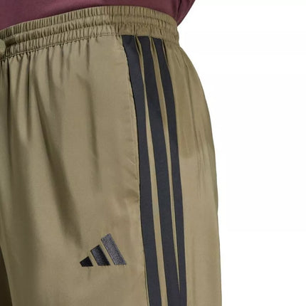 Vyriškos kelnės adidas Essentials Stanford su 3 dryželiais, atvirais kraštais, alyvuogių spalvos JE6401