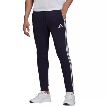 Adidas Essentials Flisinės kelnės su 3 juostomis ir siaurėjančiais galais M GK8823