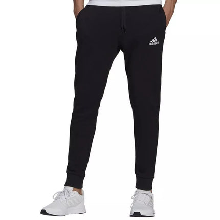 Adidas Essentials siaurėjančios kelnės su rankogaliais M GK9222