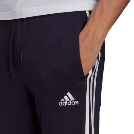 Adidas Essentials Flisinės kelnės su 3 juostomis ir siaurėjančiais galais M GK8823