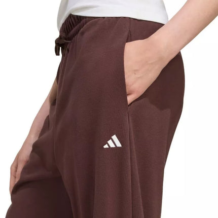 adidas Essentials mažu logotipu, prancūziško frotė audinio, su rankogaliais apačioje, moteriškos kelnės, rudos JX3864