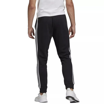 adidas Essentials Tapered Cuff 3 Stripes M GK8831 kelnės