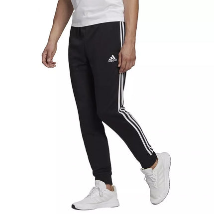 adidas Essentials Tapered Cuff 3 Stripes M GK8831 kelnės