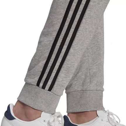 Adidas Essentials Kelnės su siaurėjančiais rankogaliais ir 3 juostelėmis M GK8889