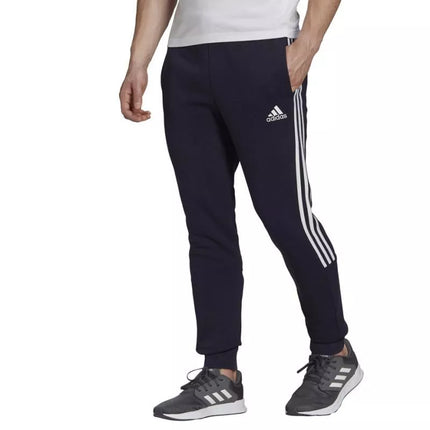 Adidas Essentials Vyriškos siaurėjančios kelnės su 3 juostelėmis GK8977