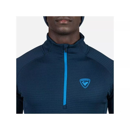 Rossignol Blackside Fleece
Tamsiai mėlynas pusiau užtraukiamas megztinis