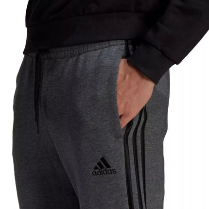 Vyriškos kelnės Adidas Essentials Tapered Cuff 3 Stripes M GK8826