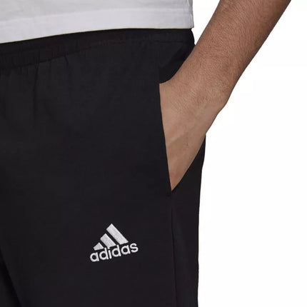 Adidas Essentials siaurėjančios atviro krašto kelnės M GK9222