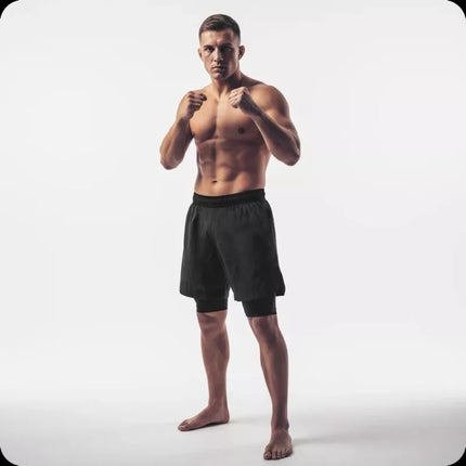 Juodi MMA šortai su leginsais DBX Bushido