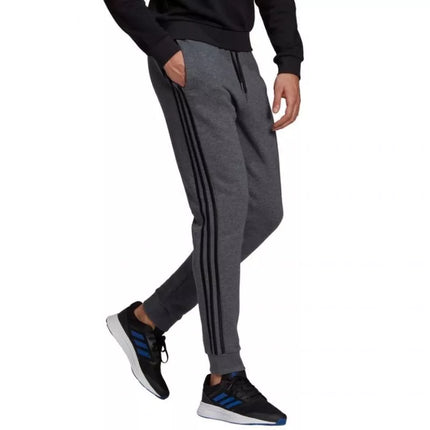 Vyriškos kelnės Adidas Essentials Tapered Cuff 3 Stripes M GK8826